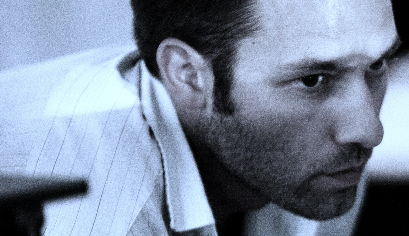 Jullian FICARELLI, French-Italian film director, writer and producer — blue-toned portrait